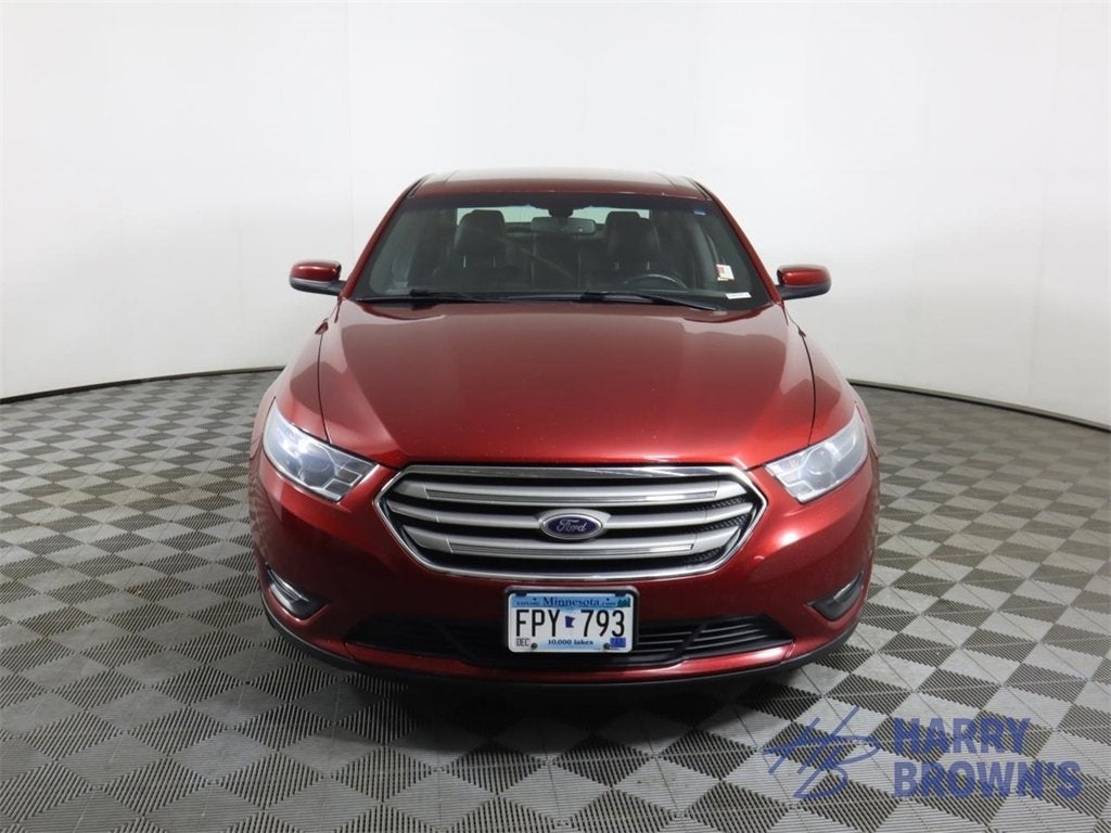 Used 2015 Ford Taurus SEL with VIN 1FAHP2E87FG124085 for sale in Faribault, Minnesota